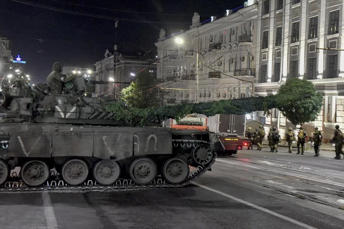 Private military company Wagner Group servicemen prepare to leave downtown Rostov-on-Don, southern Russia, on June 24.
