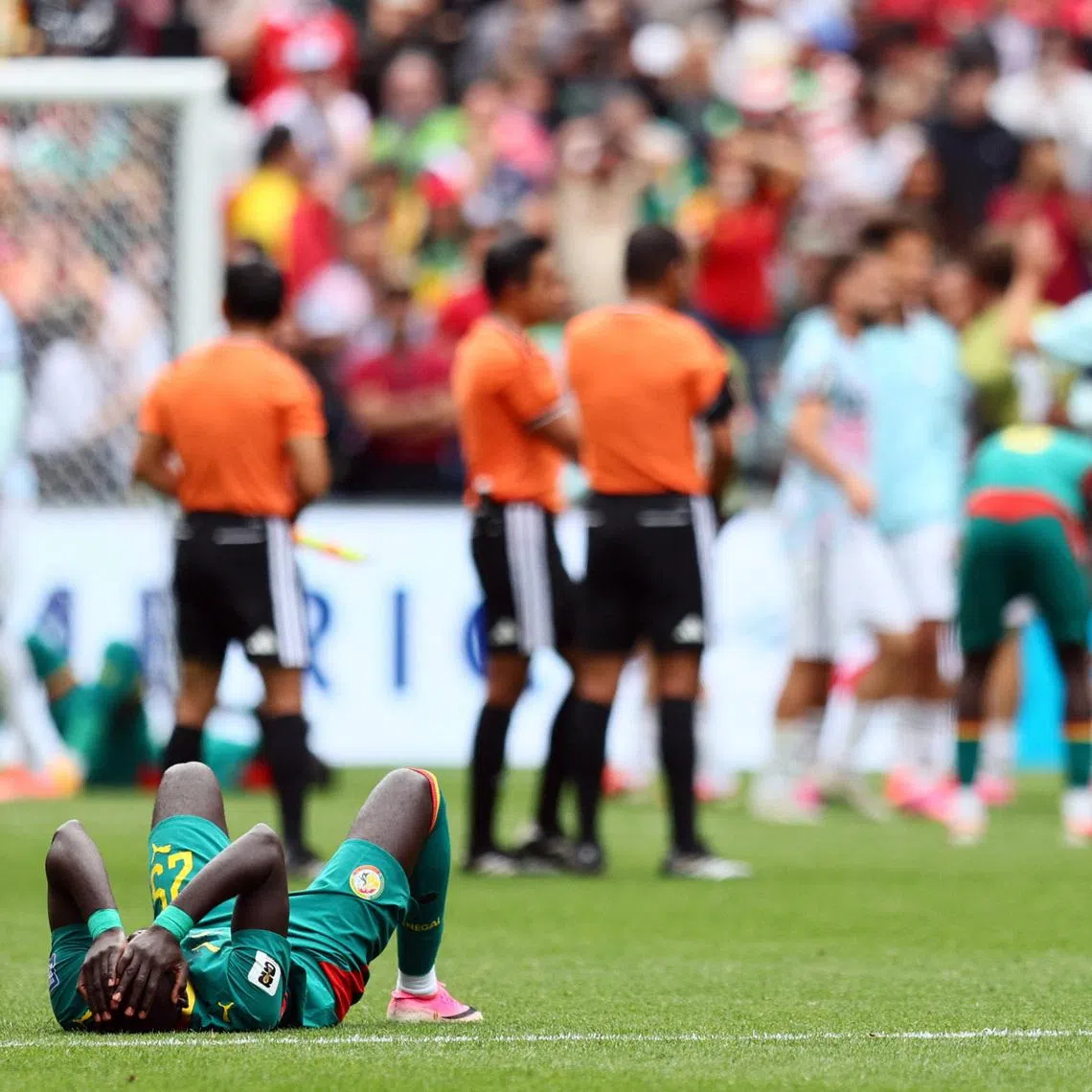 Soccer Football - FIFA World Cup 2026 - Round of 32 - Belgium v Senegal - Seattle Stadium, Seattle, Washington, U.S. - July 1, 2026  Senegal's El Hadji Malick Diouf looks dejected after the match as Senegal are eliminated from the World Cup IMAGN IMAGES via Reuters/Blake Dahlin
