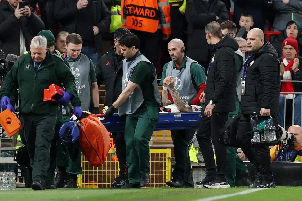 Soccer Football - UEFA Champions League - Round 16 - Second Leg - Liverpool v Galatasaray - Anfield, Liverpool, Britain - March 18, 2026 Galatasaray's Noa Lang is stretchered off after sustaining an injury REUTERS/Phil Noble