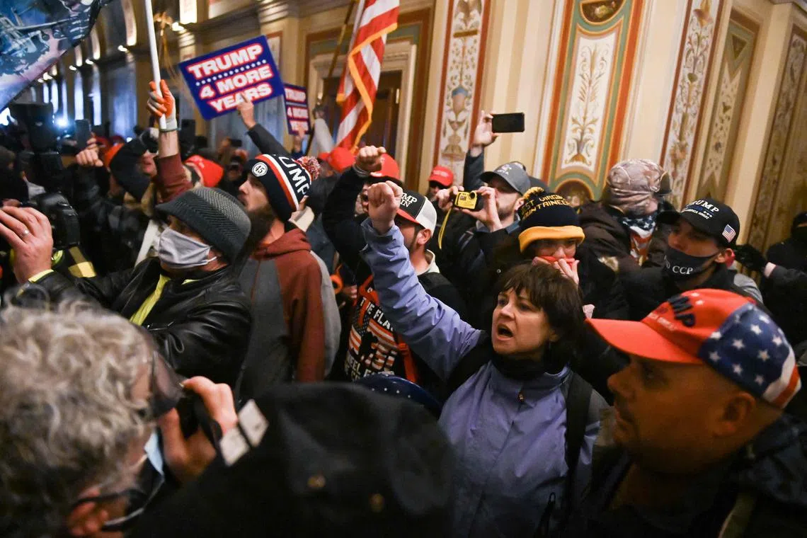 The rioters stormed the seat of US democracy on Jan 6, 2021, in a bid to halt the transfer of power to Mr Joe Biden.