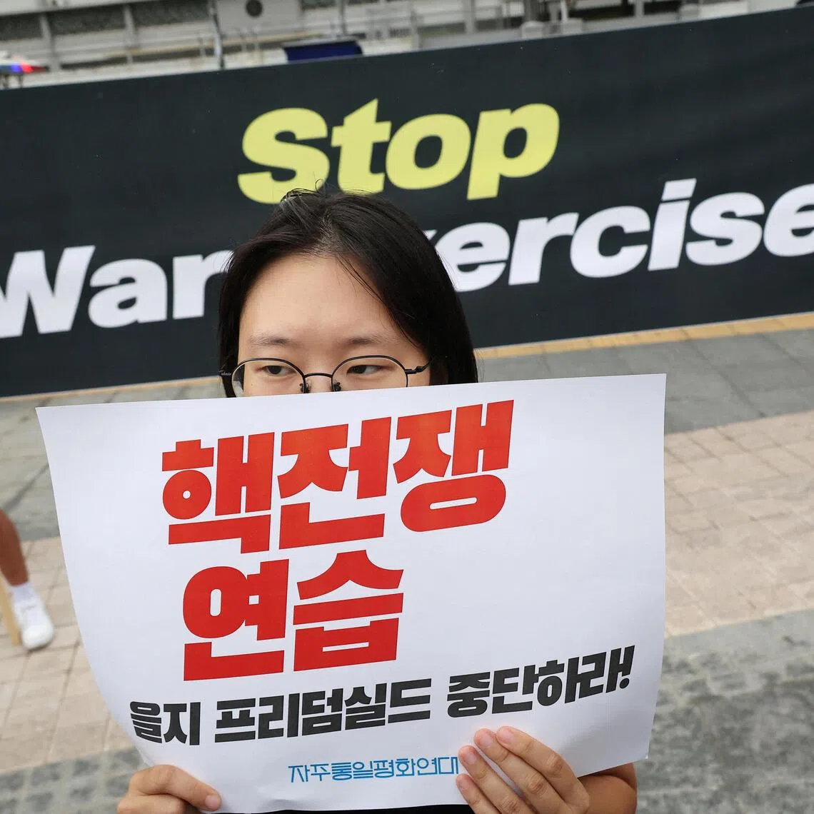 Anti-war protesters calling for a halt to the annual joint military exercises between South Korea and the US on Aug 17.