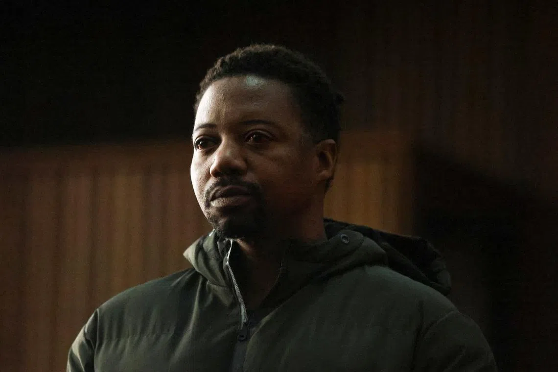 Ndodana Mkhanyisi Tshuma, a British citizen of Zimbabwean heritage, wanted by British authorities in connection with the murder of his wife and two daughters in Bedfordshire, appears at the Johannesburg Central District Magistrate's Court, in Johannesburg, South Africa, July 13, 2026. REUTERS/Oupa Nkosi