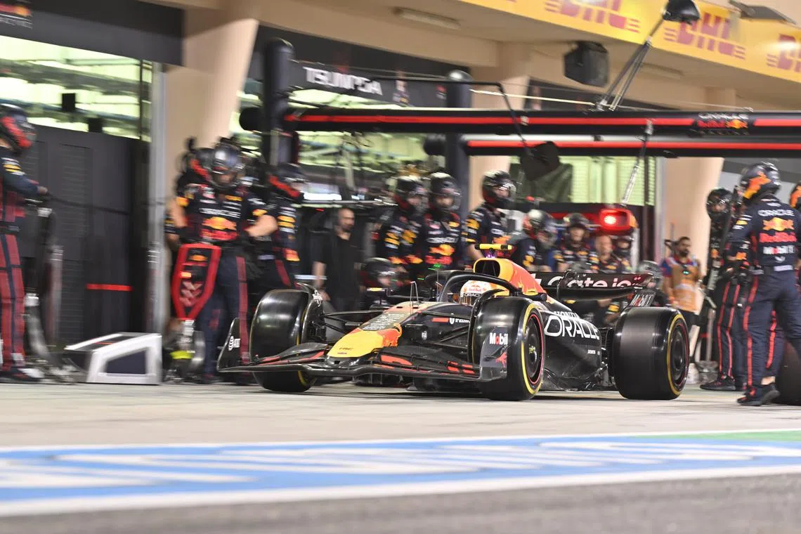 Red Bull Racing driver Max Verstappen exits from a completed pit stop despite the light remains red on the gantry during the Formula One Bahrain Grand Prix in Sakhir, Bahrain, on April 13.
