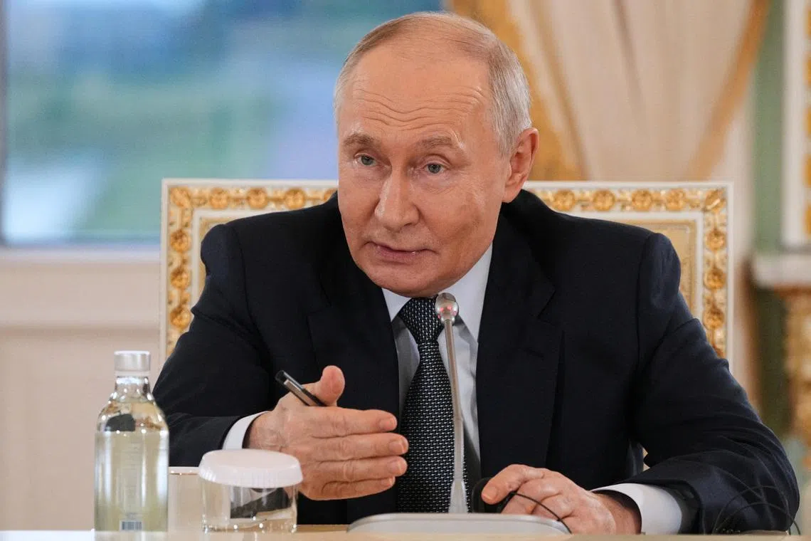 Russian President Vladimir Putin speaks to representatives of international news agencies on the sidelines of the St. Petersburg International Economic Forum, at the Constantine Palace in St. Petersburg, Russia, June 4, 2026.  Dmitri Lovetsky/Pool via REUTERS