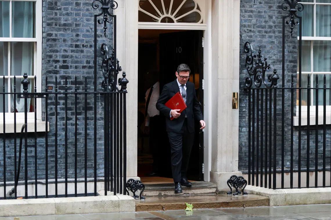Image 3: Britain's Prime Minister Andy Burnham leaves 10 Downing Street to attend PMQs at the House of Commons, in London, Britain October 21, 2026. REUTERS/Hiba Kola