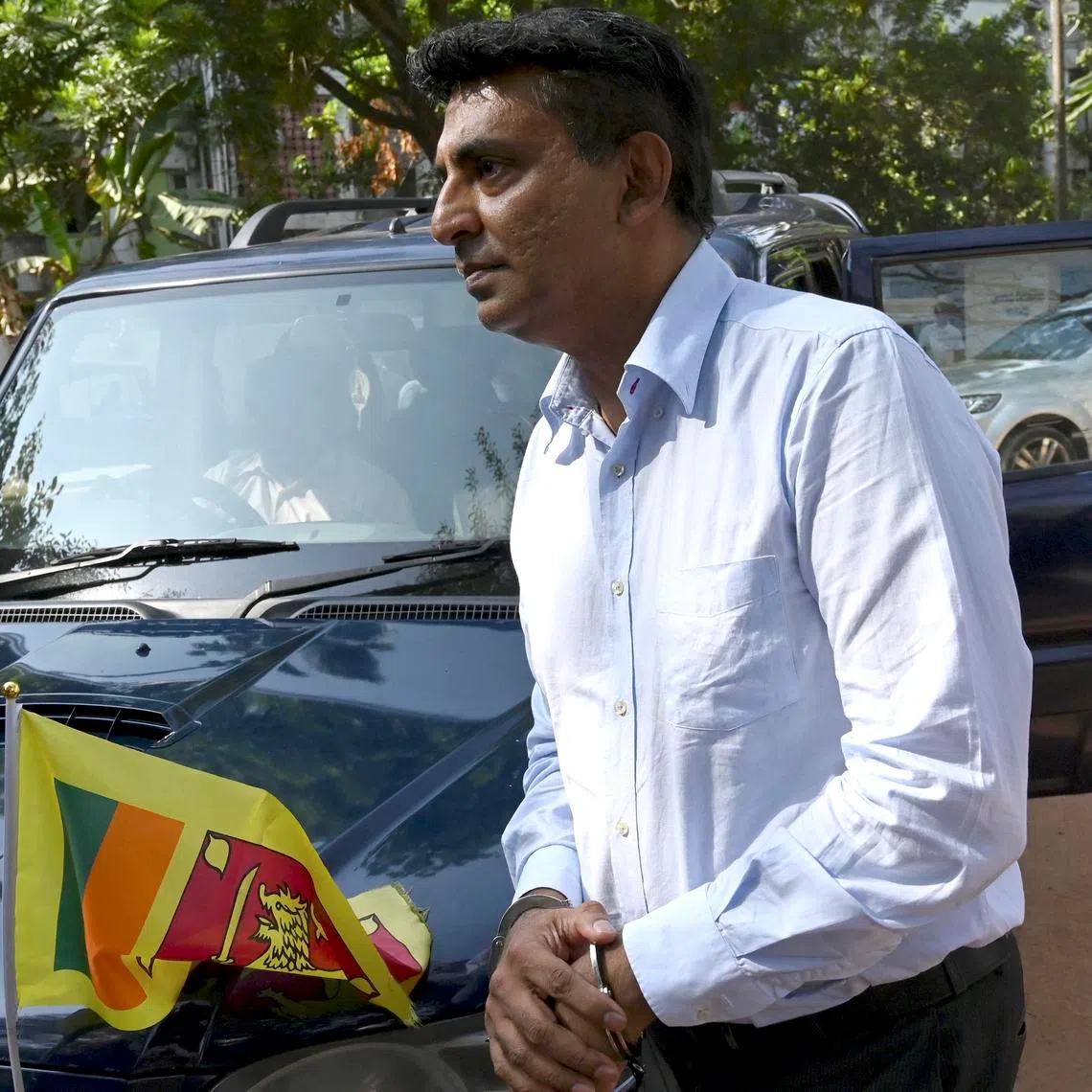 Former SriLankan Airlines CEO Kapila Chandrasena arrives at the Magistrate's Court following his arrest, in Colombo on February 6, 2020. 