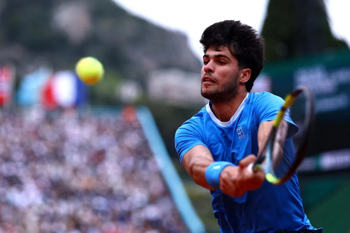 Tennis - ATP Masters 1000 - Monte Carlo Masters - Monte Carlo Country Club, Roquebrune-Cap-Martin, France - April 12, 2026 Spain's Carlos Alcaraz in action during his final match against Italy's Jannik Sinner REUTERS/Manon Cruz/File Photo