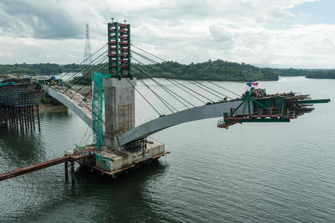 A bridge on the highway connecting Nusantara and Balikpapan, East Kalimantan, remains under construction.