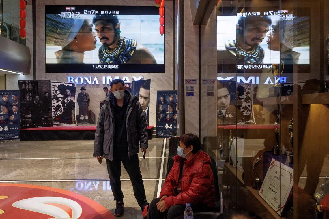 FILE PHOTO: A screen shows a trailer for the movie \"Black Panther: Wakanda Forever\" by Marvel Studios at a cinema in Beijing, China, February 6, 2023. REUTERS/Thomas Peter/File Photo