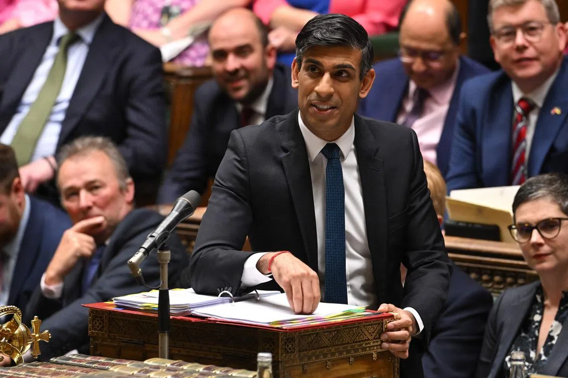 A handout photograph released by the UK Parliament shows Britain's Prime Minister Rishi Sunak speaking during Prime Minister's Questions (PMQs), in the House of Commons, in London, on July 19, 2023. (Photo by JESSICA TAYLOR / UK PARLIAMENT / AFP) / RESTRICTED TO EDITORIAL USE - NO USE FOR ENTERTAINMENT, SATIRICAL, ADVERTISING PURPOSES - MANDATORY CREDIT " AFP PHOTO / Jessica Taylor /UK Parliament"