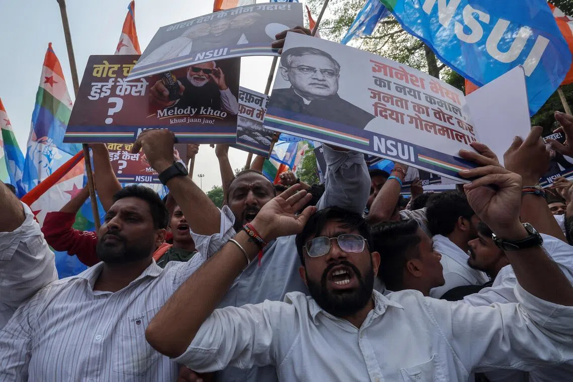 Members of National Students’ Union of India take part in a protest demanding the resignation of Chief Election Commissioner Gyanesh Kumar at in New Delhi, on Oct 13.
