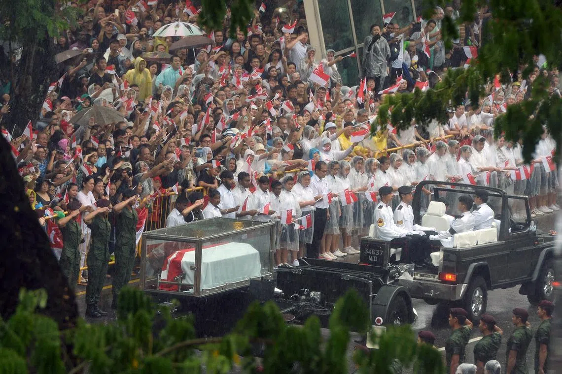 Singaporeans holding a final farewell to founding prime minister Lee Kuan Yew as the cortege filed past City Hall on March 29, 2015.