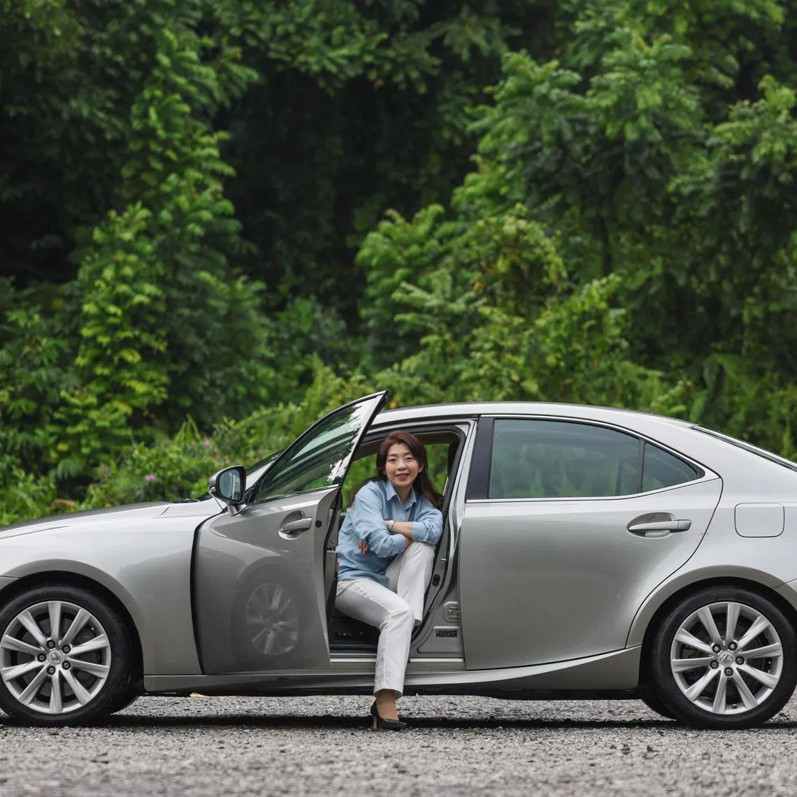 ST20240827_202424900534: Gin Tay/ctmycar11/ Chris Tan/
Profile of Author-educator Justina Tan and her Lexus, at Dempsey on Aug 27, 2024.