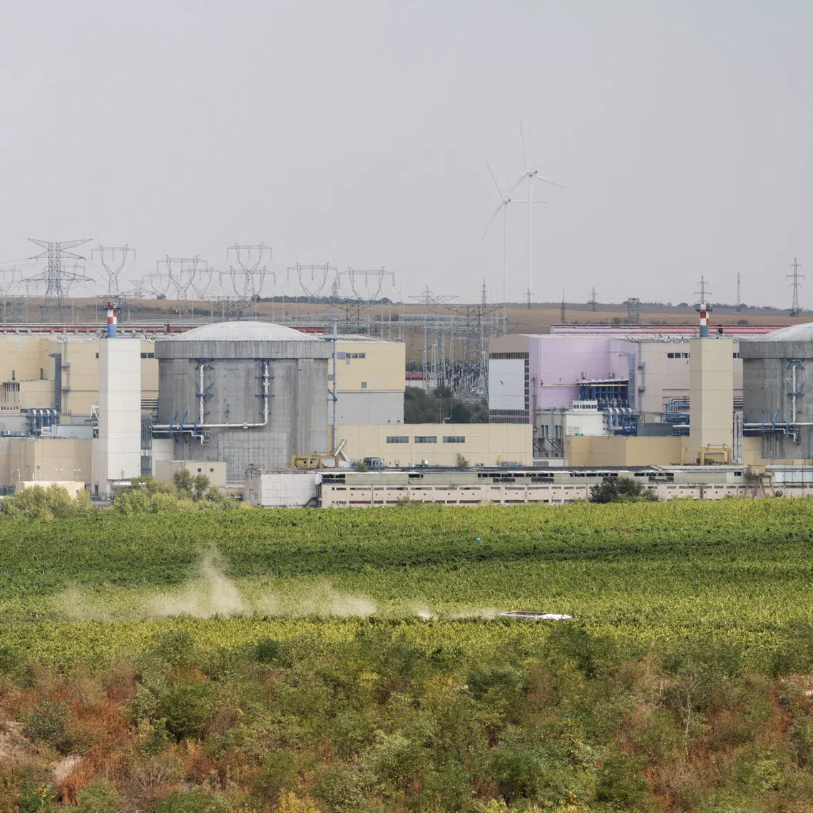 FILE PHOTO: View of the first and second nuclear reactors of state-owned nuclear power producer Nuclearelectrica, in Cernavoda, Constanta, Romania September 3, 2025. Inquam Photos/George Calin via REUTERS/File Photo
