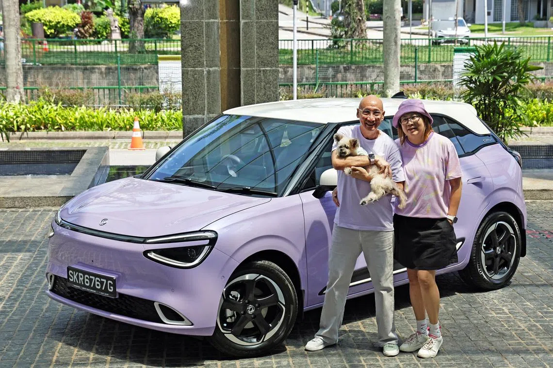 ST20250802_202514400111  Kelvin Chng

ycmycar22

1. Profile shot of Mr Tam, his wife and dog with the car.

2. Photo of boot
3. Photo of a custom-made bear they made with the nickname of the car.

Story Background


Me and My Car: Until early 2025, Mr Andrew Tam had never owned an electric vehicle (EV) ? or a car in any colour other than white. But that changed in January when the assistant director at the Singapore Institute of Technology?s alumni office bought his first EV: a purple Dongfeng Box. 