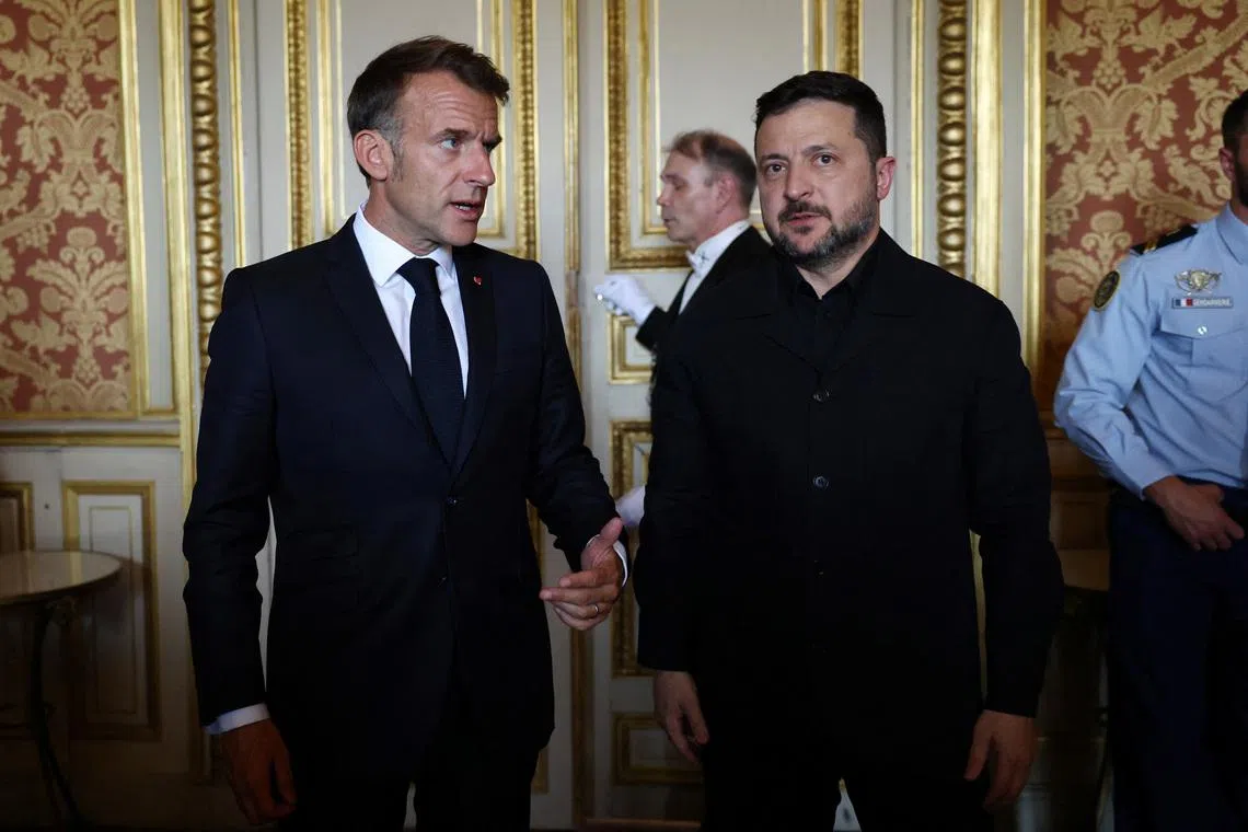 French President Emmanuel Macron and Ukrainian President Volodymyr Zelensky at the Quai d’Orsay in Paris, before a meeting with other leaders involved in the ‘Coalition of the Willing’ supporting Ukraine, on July 13.