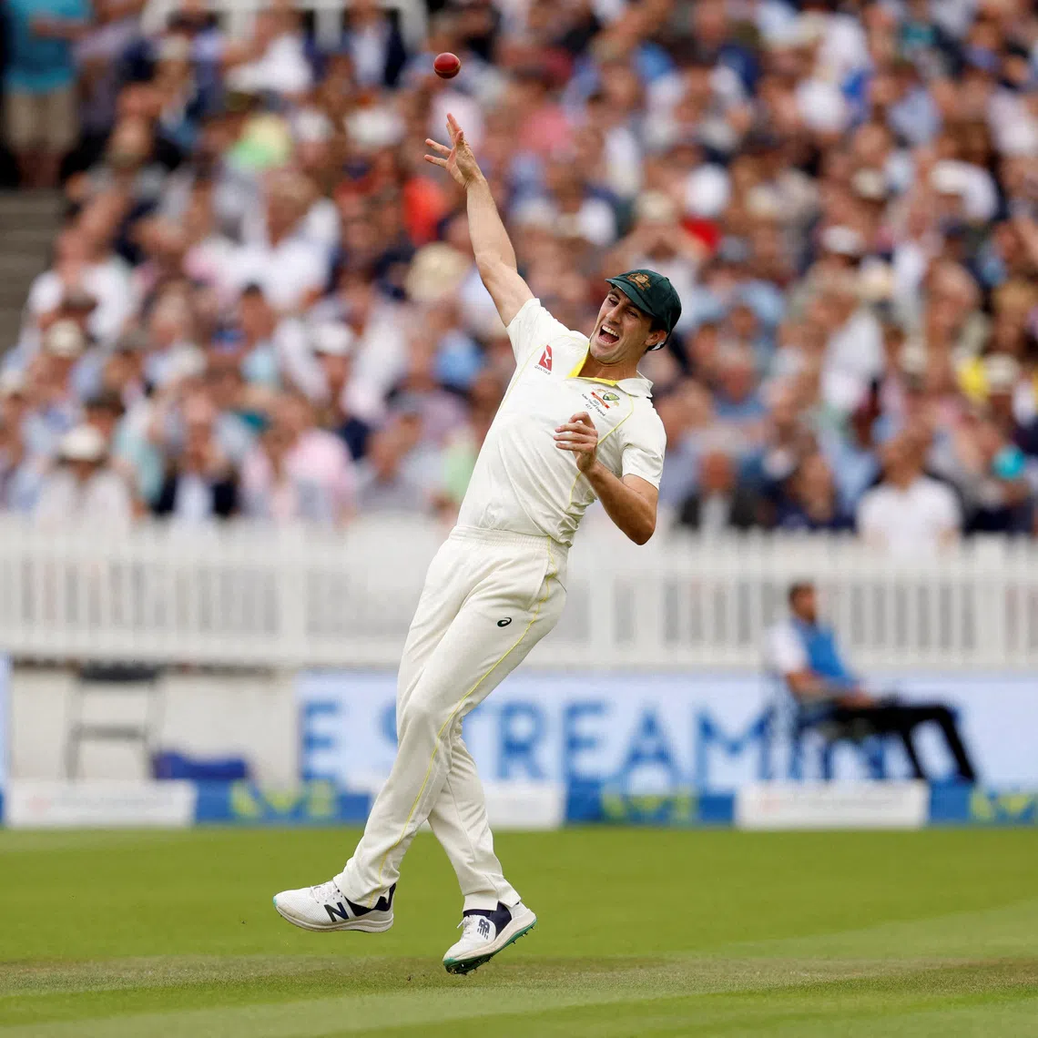 Cricket - Ashes - Second Test - England v Australia - Lords, London, Britain - June 30, 2023 Australia's Pat Cummins takes a catch to dismiss England's Harry Brook off the bowling of Mitchell Starc Action Images via Reuters/Peter Cziborra