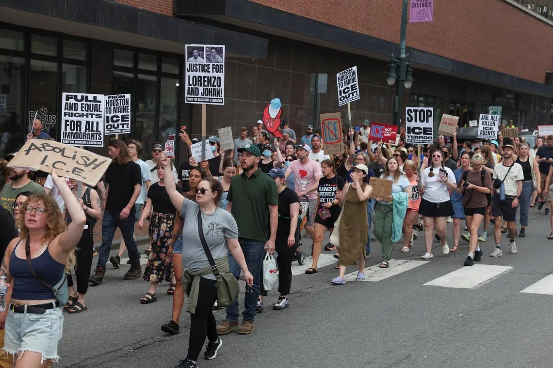 Demonstrators march a day after a U.S. Immigration and Customs Enforcement (ICE) agent killed a driver in the coastal Maine town of Biddeford, in Portland, Maine, U.S., July 14, 2026. REUTERS/Shannon Stapleton