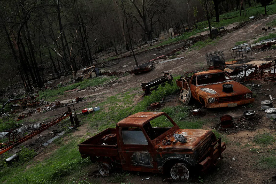 FILE PHOTO: The remains of a burnt down house, destroyed during the bushfire season are pictured in the community of Wytaliba, New South Wales, Australia January 29, 2020. REUTERS/Jorge Silva/File Photo