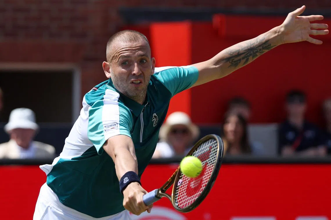 Tennis - Queen's Club Championships - Queen's Club, London, Britain - June 16, 2025 Britain's Dan Evans in action during his round of 32 match against Frances Tiafoe of the U.S. REUTERS/Toby Melville
