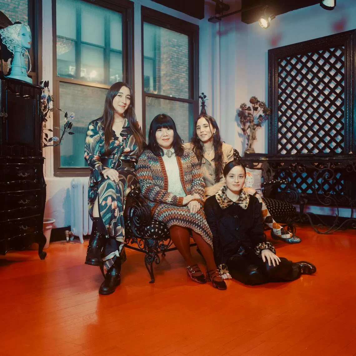 Anna Sui (centre) with her nieces (from left) Isabelle Sui, Jeannie Sui Wonders and Chase Sui Wonders at her atelier and showroom in New York, Dec 19, 2025. 