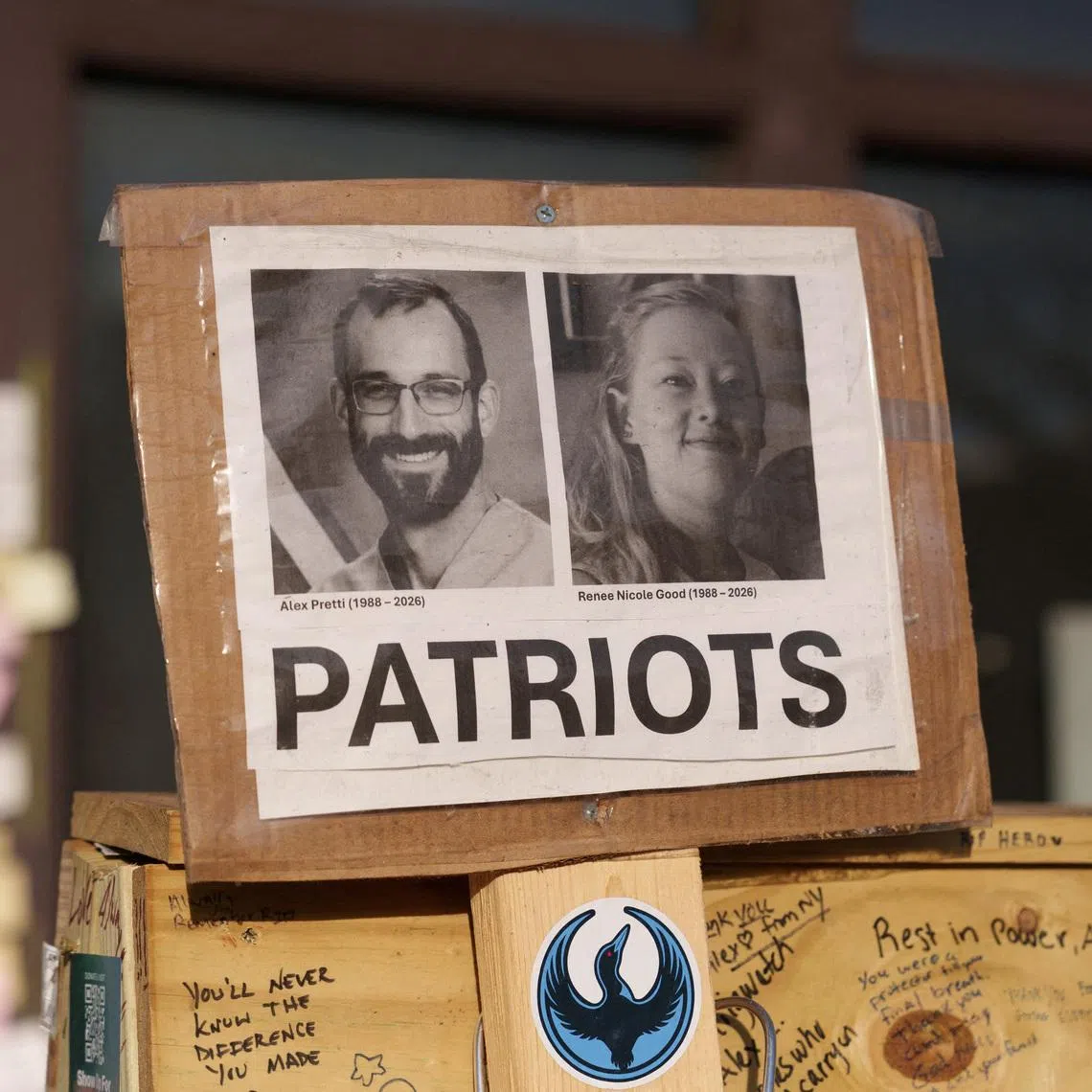 A sign honouring Alex Pretti and Renee Good as patriots rests at a memorial in Minneapolis, Minnesota, USA, on March 12.