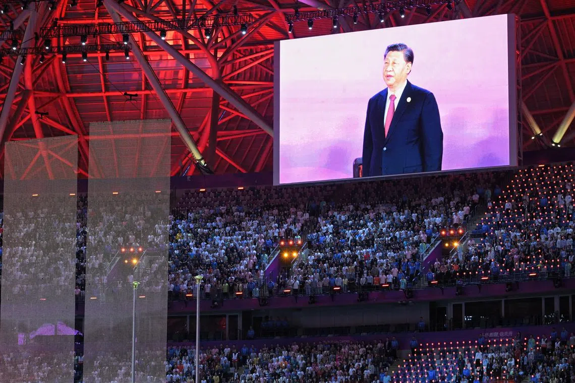 Chinese President Xi Jinping is seen in a digital screen during a segment of the opening ceremony of the 19th Asian Games held at the Hangzhou Olympic Sports Center Stadium on Sept 23.