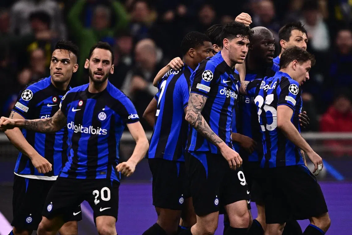 Inter Milan's Romelu Lukaku (third from right) celebrates after opening the scoring.