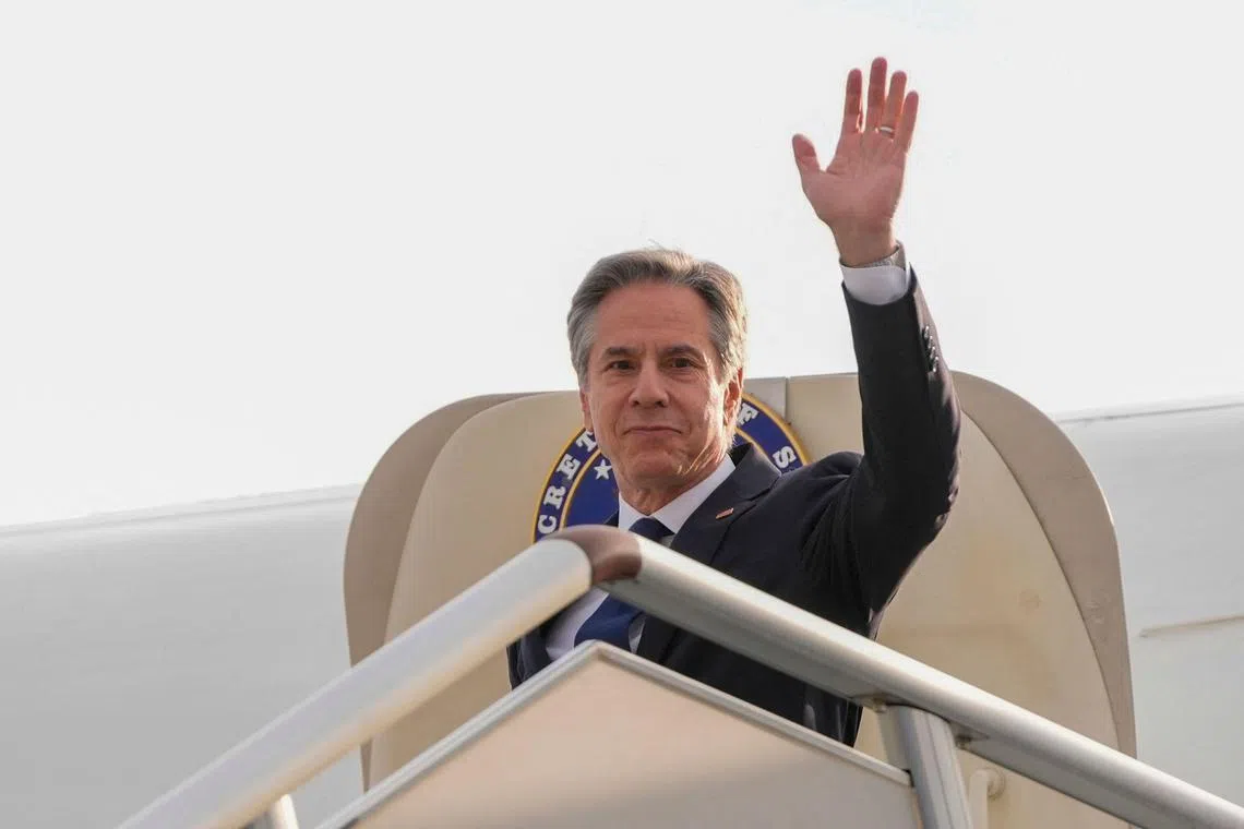 US Secretary of State Antony Blinken waves on his arrival in Shanghai on April 24, 2024.