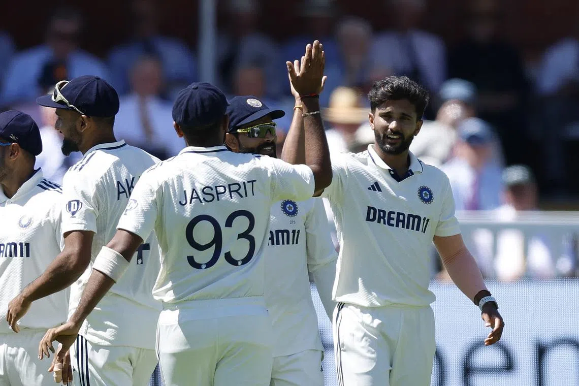 FILE PHOTO: Cricket - International Test Match Series - Third Test - England v India - Lord's Cricket Ground, London, Britain - July 10, 2025 India's Nitish Kumar Reddy celebrates with Jasprit Bumrah after the wicket of England's Zak Crawley Action Images via Reuters/Peter Cziborra/File Photo