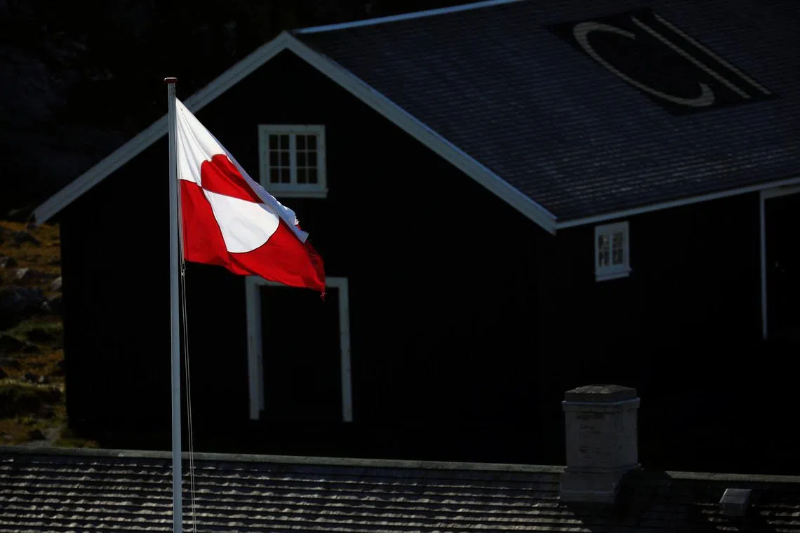 The Greenland Flag is pictured in Nuuk, Greenland, September 5, 2021. REUTERS/Hannibal Hanschke/ File Photo