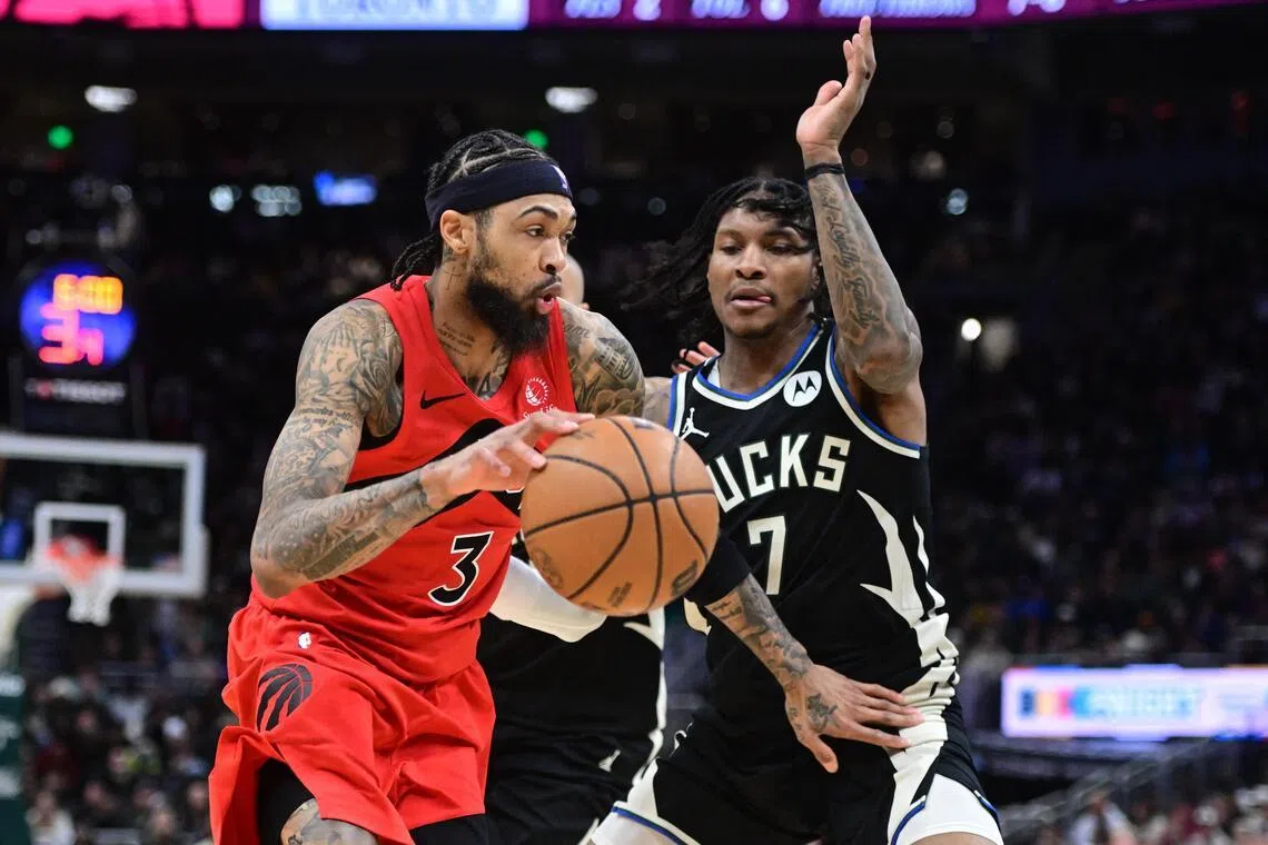 Toronto Raptors forward Brandon Ingram drives for the basket against Milwaukee Bucks guard Kevin Porter in the second quarter at Fiserv Forum. 