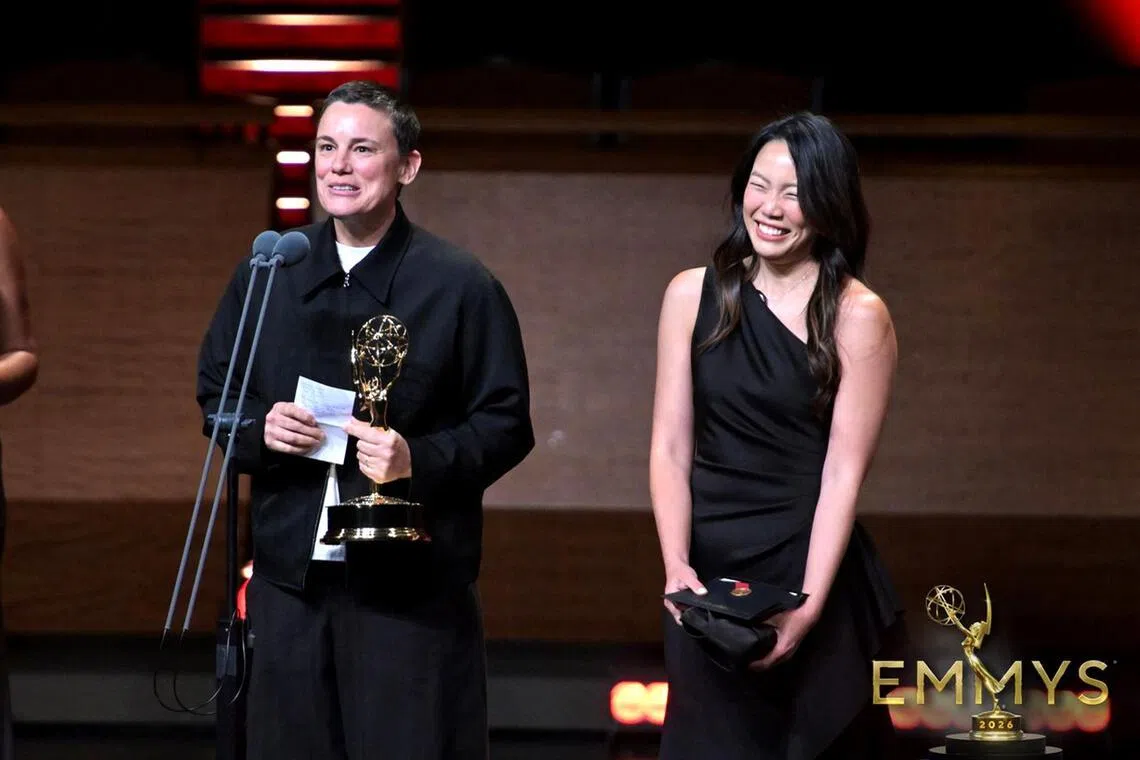 Singaporean art director Amanda Koh (left) with director Lauren Fisher at the 47th Sports Emmy Awards.