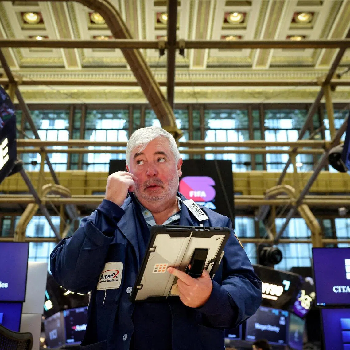 Traders working on the floor of the New York Stock Exchange, in New York City, on March 2.