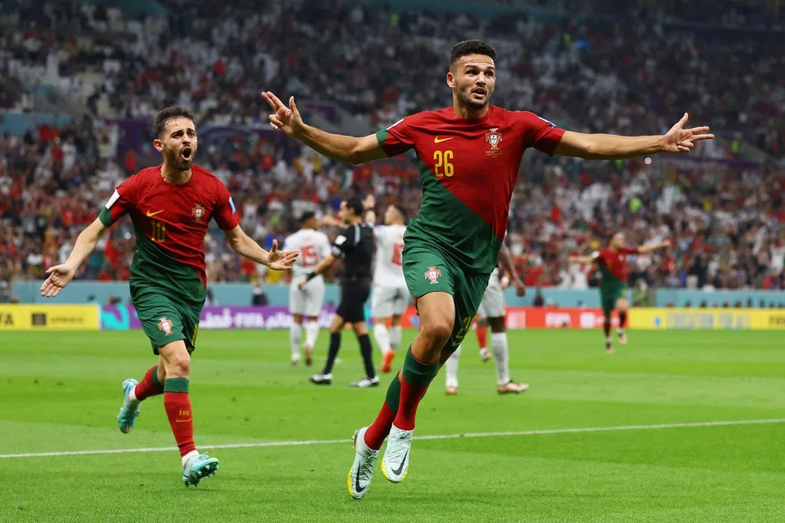 Portugal's Goncalo Ramos celebrates scoring their first goal during the Qatar 2022 World Cup round of 16 football match between Portugal and Switzerland at Lusail Stadium in Lusail, Qatar, Dec 6, 2022.