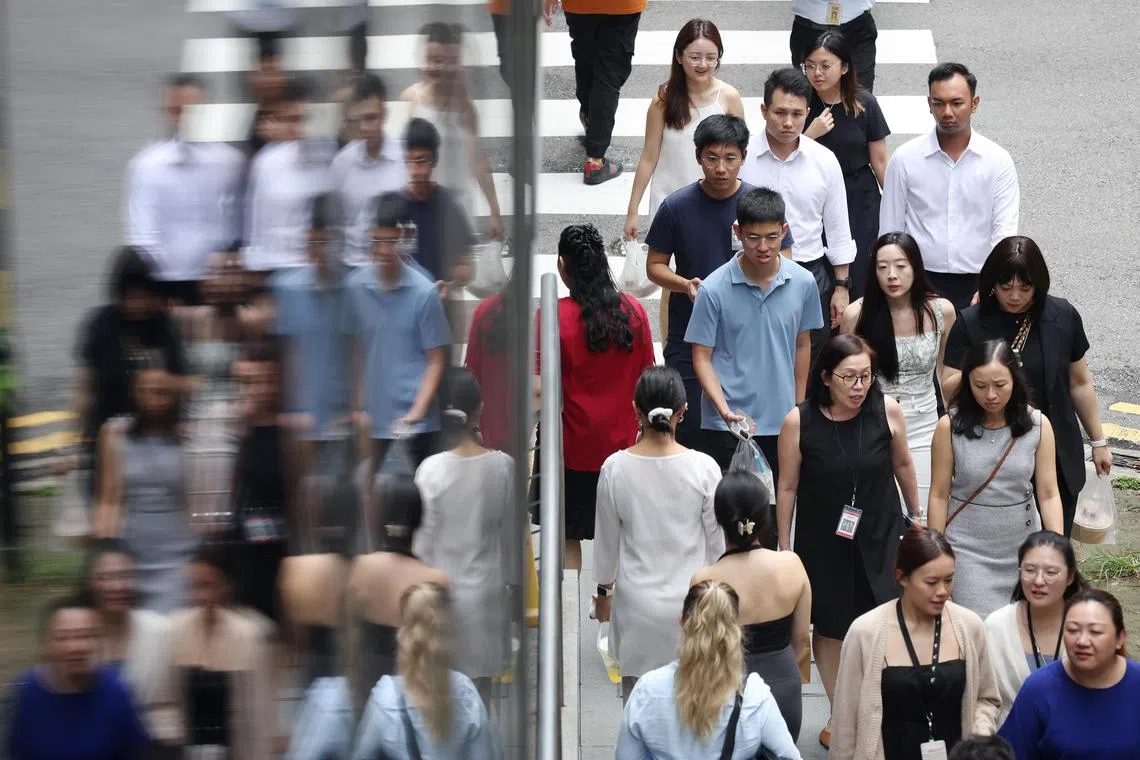 Pixgeneric / Generic photo of office workers at Robinson Road on May 19, 2025. Manpower, economy, jobs, salary, income, wages, pmet, workforce