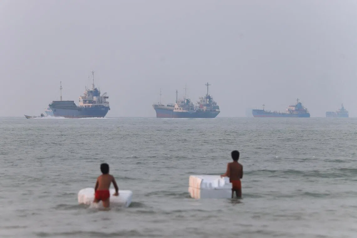 Vessels in the Strait of Hormuz near the beach of Bandar Abbas, Iran, June 30.
