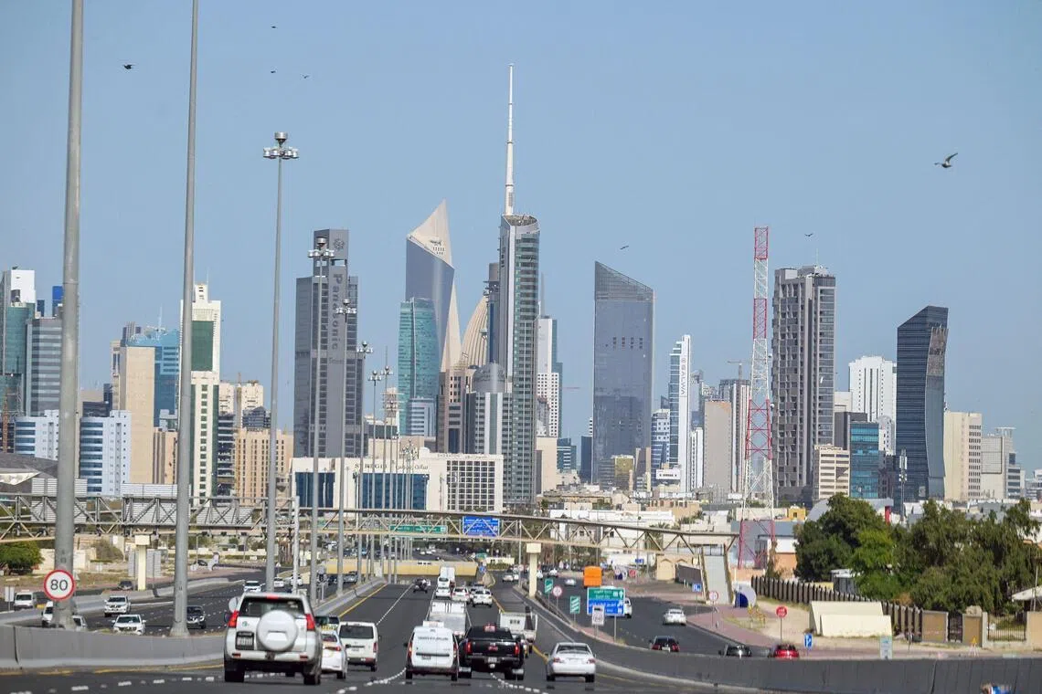 Vehicles driving along the highway leading to and from Kuwait City on March 2.
