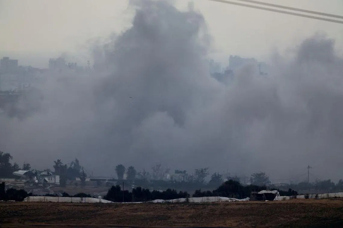 Smoke rises after an explosion in northern Gaza, as seen from southern Israel, amid the ongoing conflict between Israel and the Palestinian group Hamas, November 20, 2023. REUTERS/Alexander Ermochenko