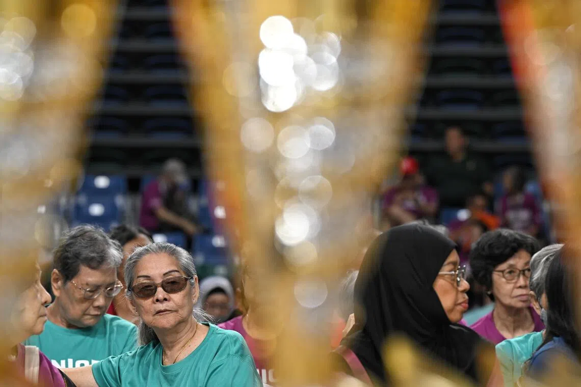 Seniors wait for the prize giving ceremony to start at the end of the Seniors National Games Finals held at the OCBC Arena on August 4, 2026.