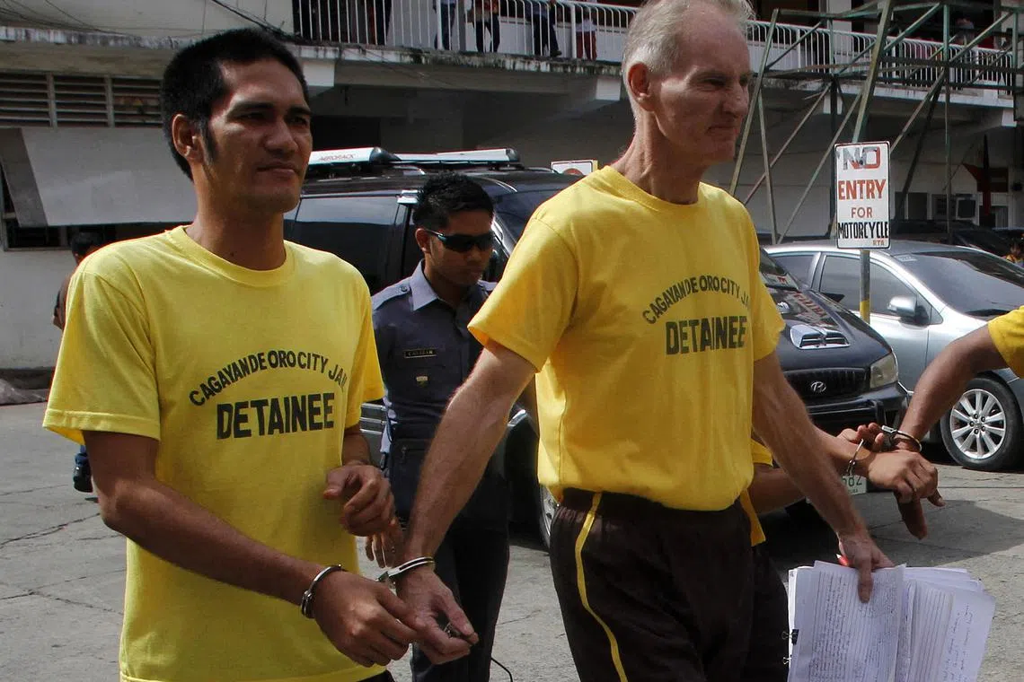 This June 16, 2015, file photo shows Australian Peter Scully, who has been sentenced by a Philippine court to 129 years in jail for raping and trafficking two girls.