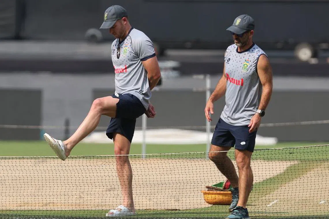 Cricket - ICC Cricket World Cup 2023 - South Africa Practice - Narendra Modi Stadium, Ahmedabad, India - November 9, 2023 South Africa head coach Rob Walter and David Miller during practice REUTERS/Amit Dave
