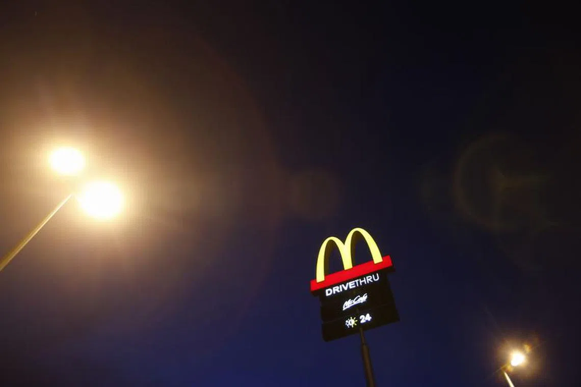 FILE PHOTO: The corporate logo of McDonald's Corp fast food chain is seen on display in the Malaysian town of Pekan May 4, 2013. REUTERS/Bazuki Muhammad