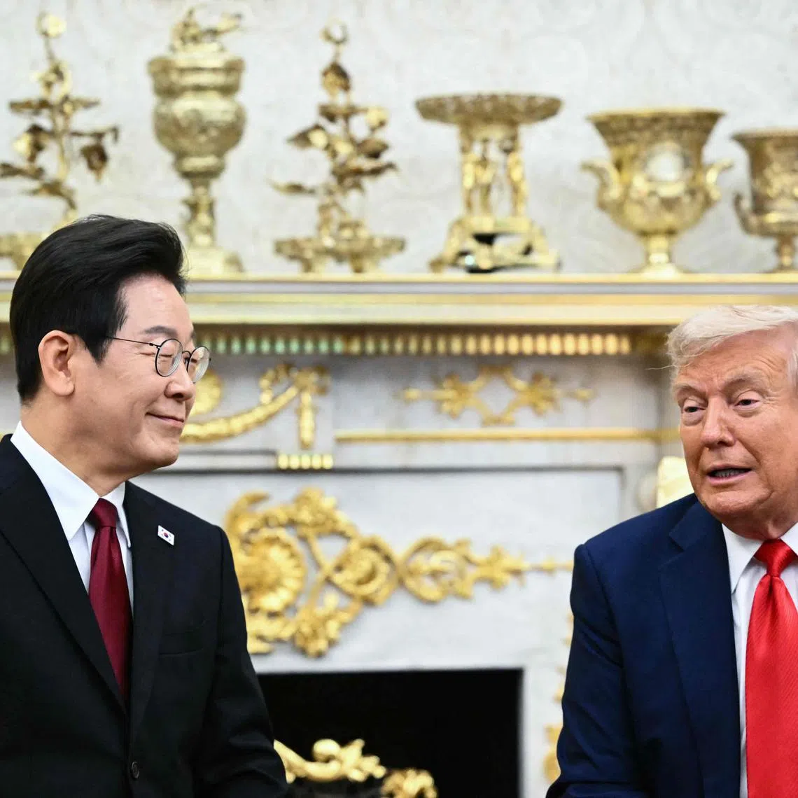 US President Donald Trump and South Korean President Lee Jae Myung attend a bilateral meeting in the Oval Office in Washington, DC.