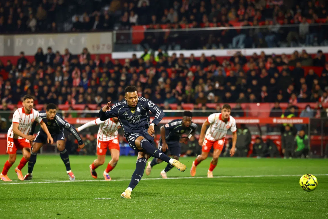 Soccer Football - LaLiga - Girona v Real Madrid - Estadi Montilivi, Girona, Spain - November 30, 2025 Real Madrid's Kylian Mbappe scores their first goal from the penalty spot REUTERS/Albert Gea