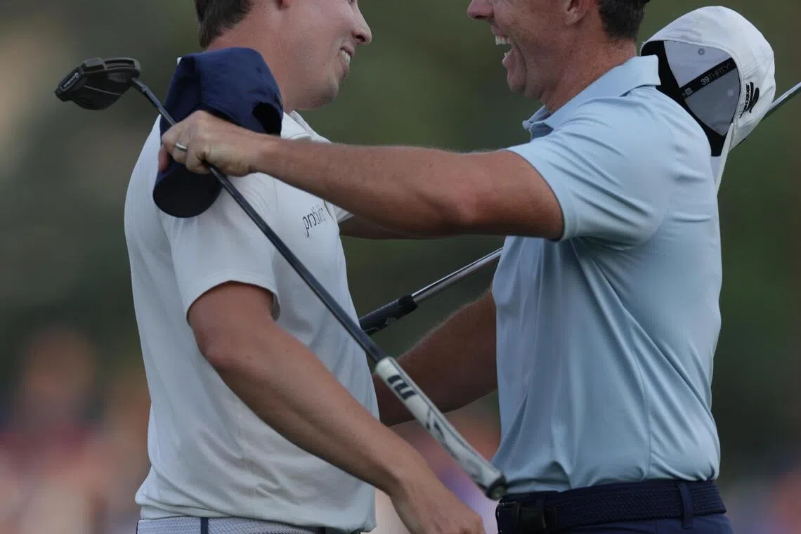 Matt Fitzpatrick of England hugs Rory McIlroy of Northern Ireland after the final round of the DP World Tour Championship.