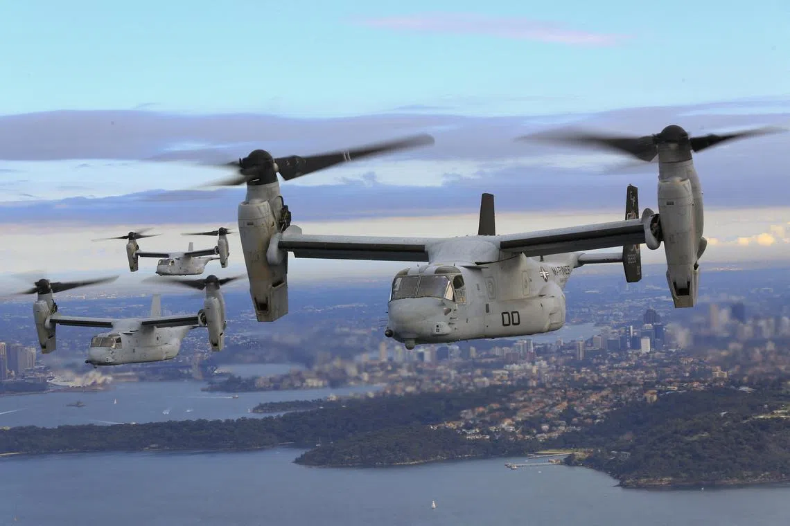 (FILES) This image obtained from the US Marine Corps shows three MV-22B Osprey tiltrotor aircrafts flying in formation above the Pacific Ocean off the coast of Sydney on June 29, 2017. A United States Osprey military aircraft crashed on a remote island north of Australia's mainland while taking part in war games on August 27, 2023, Australia's Defence Department said. (Photo by Amy PHAN / US MARINE CORPS / AFP) / RESTRICTED TO EDITORIAL USE - MANDATORY CREDIT "AFP PHOTO / US MARINE CORPS / Lance Cpl. Amy PHAN" - NO MARKETING NO ADVERTISING CAMPAIGNS - DISTRIBUTED AS A SERVICE TO CLIENTS