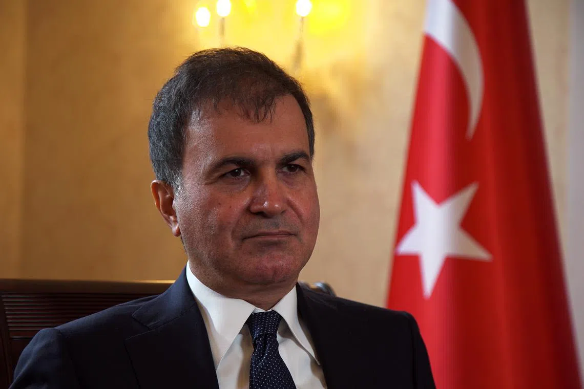 FILE PHOTO: Turkey's European Union Affairs Minister Omer Celik speaks during an interview with Reuters at the Turkish Embassy in London, Britain, September, 14, 2017. REUTERS/Will Russell/File photo
