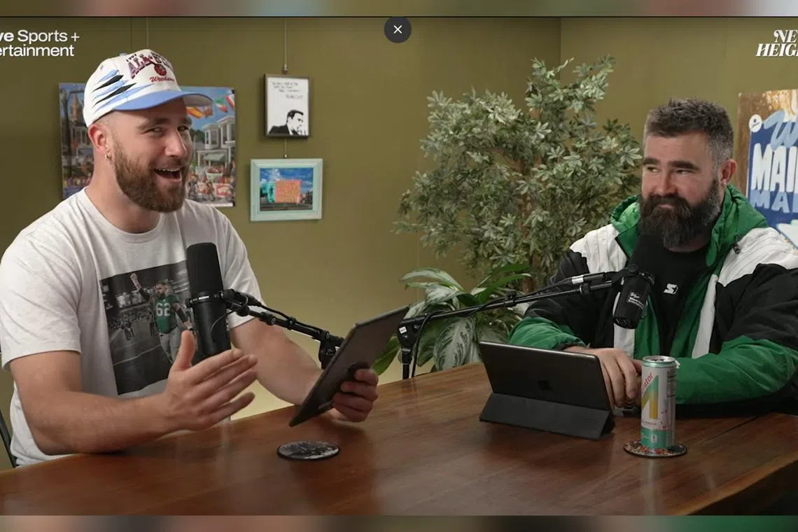 Taylor Swift's boyfriend Travis Kelce (left) gushed about Singapore in a chat with brother Jason in the March 13 episode of their New Heights podcast.