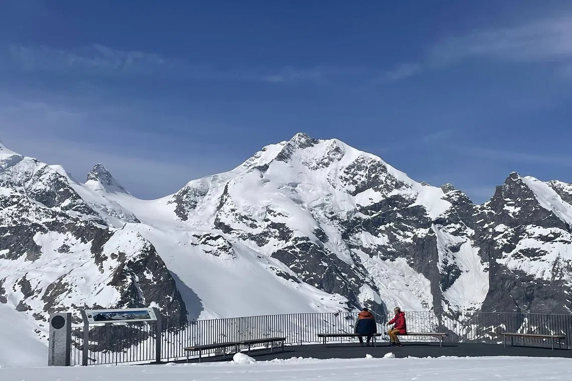Travelers often take a cable car to the top of Diavolezza for some fun in the snow.